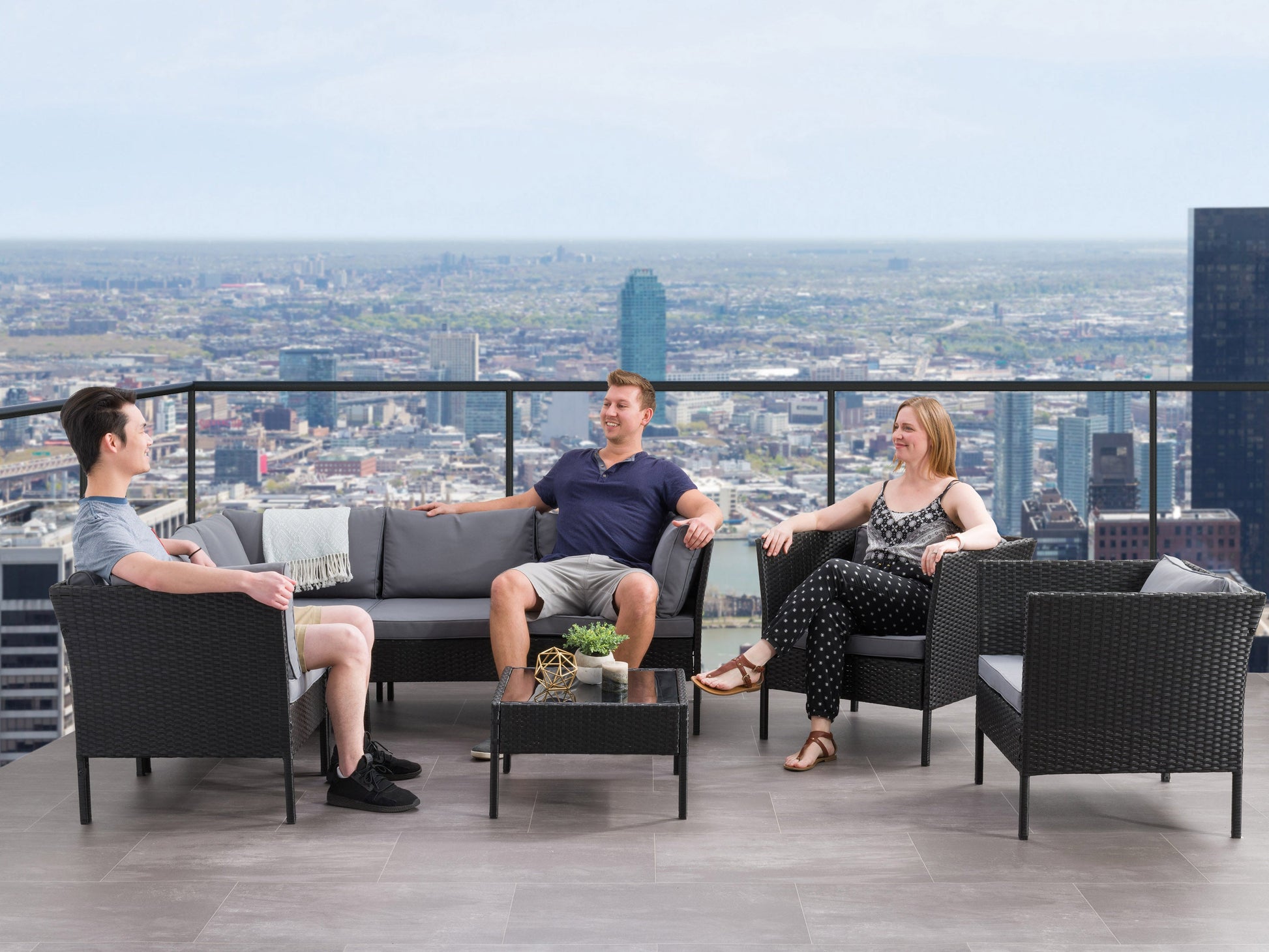 black and ash grey L Shaped Outdoor Sectional, 8pc Parksville Collection lifestyle scene by CorLiving#color_black-and-ash-grey